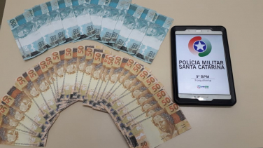 Notícia - Homem é preso com R$ 2,3 mil em notas falsas