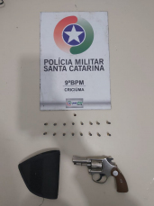 Notícia - Homem é preso em posto de gasolina por porte ilegal de arma de fogo