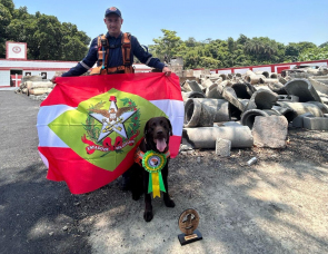 Notícia - Dupla de Araranguá é destaque nacional em buscas com cães