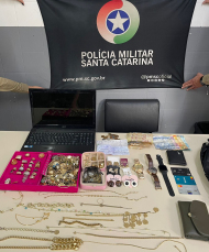 Notícia - Roubo à mão armada é registrado em prédio no Rio Maina
