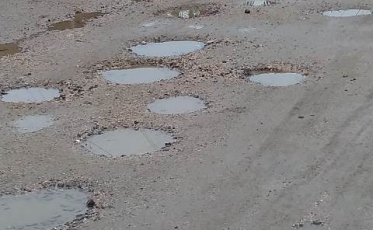 Buracos na estrada do Bairro Boa Vista