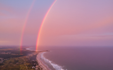 Arco-íris em SC surge com sol alaranjado no entardecer: ‘Me senti abraçado por Deus’